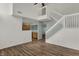 View of the living room featuring wood floors and a staircase at 503 Fayette Dr, Westfield, IN 46074