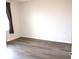 Bedroom with hardwood flooring and lots of natural light at 5069 Lilium Dr, Plainfield, IN 46168