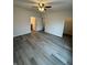 Bedroom with a ceiling fan and hardwood flooring at 5069 Lilium Dr, Plainfield, IN 46168