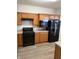 The kitchen features stainless steel appliances, and beautiful wood cabinets at 5069 Lilium Dr, Plainfield, IN 46168