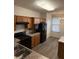 Well-lit kitchen featuring stainless steel appliances, and wood flooring at 5069 Lilium Dr, Plainfield, IN 46168