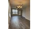 Bright living room with a ceiling fan and lots of natural light at 5069 Lilium Dr, Plainfield, IN 46168