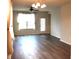 Spacious living room with hardwood flooring and lots of natural light at 5069 Lilium Dr, Plainfield, IN 46168