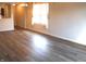 Spacious living room featuring hardwood flooring and ample natural light at 5069 Lilium Dr, Plainfield, IN 46168