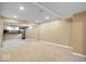 Spacious finished basement with carpet flooring and recessed lighting, complete with a bar at 5343 Ripplingbrook Way, Carmel, IN 46033