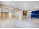 Spacious finished basement featuring a hallway and multiple doors at 5343 Ripplingbrook Way, Carmel, IN 46033