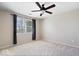 Bedroom featuring neutral walls, plush carpeting, large window and ceiling fan at 5343 Ripplingbrook Way, Carmel, IN 46033