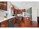 Well-equipped kitchen features stainless steel appliances, hardwood floors, and ample counter space at 5343 Ripplingbrook Way, Carmel, IN 46033