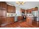 Well-equipped kitchen features stainless steel appliances, hardwood floors, and ample cabinet space at 5343 Ripplingbrook Way, Carmel, IN 46033