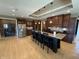 Spacious kitchen features stainless steel appliances, a large island with seating, and custom cabinetry at 5373 Ashby Ct, Greenwood, IN 46143