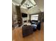 Cozy living room features a fireplace, vaulted ceilings, and comfortable seating for relaxing and entertaining guests at 5373 Ashby Ct, Greenwood, IN 46143