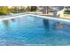 Sparkling in-ground pool with a slide and diving board, perfect for summer relaxation and Gathering fun at 5373 Ashby Ct, Greenwood, IN 46143