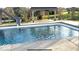 Refreshing in-ground pool with a slide and gazebo, providing a luxurious outdoor living experience at 5373 Ashby Ct, Greenwood, IN 46143