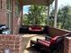 Comfortable porch with outdoor seating and grill, perfect for relaxing and enjoying the backyard view at 5373 Ashby Ct, Greenwood, IN 46143