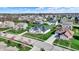 Prime aerial view of a home displays meticulous landscaping, neighborhood charm, and curb appeal at 5492 Cottage Grove Ln, Noblesville, IN 46062