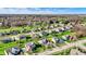 Picturesque aerial shot showcasing a vibrant neighborhood with lush greenery and well-maintained homes at 5492 Cottage Grove Ln, Noblesville, IN 46062