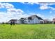 Expansive backyard offers plenty of space for recreation and relaxation at 5492 Cottage Grove Ln, Noblesville, IN 46062
