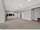 Expansive basement with recessed lighting, neutral carpet, and comfortable seating area at 5492 Cottage Grove Ln, Noblesville, IN 46062