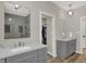 Bathroom with double vanity and glass enclosed shower at 5492 Cottage Grove Ln, Noblesville, IN 46062