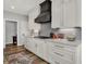 This is a well lit kitchen with a gas cooktop and stylish backsplash at 5492 Cottage Grove Ln, Noblesville, IN 46062