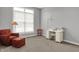 Bright office space with large window, comfortable chair, and practical desk for remote work at 5492 Cottage Grove Ln, Noblesville, IN 46062