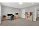 Bright home office with neutral carpet, desk area, built-in storage and natural light at 5492 Cottage Grove Ln, Noblesville, IN 46062