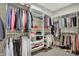 Spacious walk-in closet with custom shelving and ample storage for clothing and accessories at 5492 Cottage Grove Ln, Noblesville, IN 46062