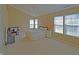 Spacious bedroom with vaulted ceilings, lots of natural light, and plush carpet, a comfortable retreat for relaxation at 5639 Aquamarine Dr, Carmel, IN 46033