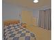 Cozy bedroom is furnished with a double bed, a matching nightstand and dresser and has curtains drawn at 5639 Aquamarine Dr, Carmel, IN 46033