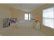 Bright bedroom with multiple windows, high ceilings, and soft carpet, perfect for rest and rejuvenation at 5639 Aquamarine Dr, Carmel, IN 46033