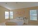 Inviting bedroom with a comfortable bed, ambient lighting, and large windows at 5639 Aquamarine Dr, Carmel, IN 46033