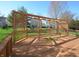 Expansive wood deck with pergola and decorative lattice, perfect for outdoor entertaining at 5639 Aquamarine Dr, Carmel, IN 46033