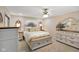 Bedroom with white furniture, carpet flooring, ceiling fan, and gothic style window at 5766 Kensington S Way, Plainfield, IN 46168