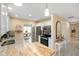 Modern kitchen featuring stainless steel appliances, updated countertops and adjacent eat-in kitchen at 5766 Kensington S Way, Plainfield, IN 46168
