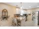Eat-in kitchen features peninsula seating with stainless steel appliances and ample cabinet space at 5766 Kensington S Way, Plainfield, IN 46168