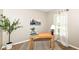 Inviting office space with neutral walls, a desk with decor, and natural light from the window at 5856 Long Ridge Pl, Indianapolis, IN 46221