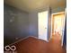View of a bedroom with hard wood floors at 5868 Hillside Ave, Indianapolis, IN 46220