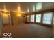 Living room with carpet, large windows and blinds at 5868 Hillside Ave, Indianapolis, IN 46220