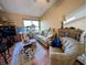 Comfortable living room with plush seating, accent tables, and natural light at 61 Osage Ct, Columbus, IN 47201