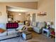 Open-concept living and dining area with neutral tones, furniture, and natural light at 61 Osage Ct, Columbus, IN 47201