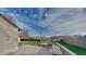 Spacious backyard deck featuring built-in seating and a lush green lawn, perfect for outdoor entertaining at 6508 Pergola Ln, Indianapolis, IN 46241