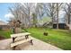 Spacious backyard featuring a play set, fire pit, picnic table, and lush lawn, perfect for outdoor entertaining at 6526 Angel Falls Dr, Noblesville, IN 46062