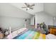 Spacious carpeted bedroom with sloped ceilings and a cozy atmosphere at 6526 Angel Falls Dr, Noblesville, IN 46062