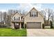 Inviting two-story home showcasing a well-kept lawn and an attached two-car garage at 6526 Angel Falls Dr, Noblesville, IN 46062
