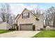Lovely house with a two-car garage, a paved driveway, and tidy landscaping at 6526 Angel Falls Dr, Noblesville, IN 46062