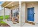 Cozy porch with rocking chairs and a welcome mat, inviting guests to relax at 6526 Angel Falls Dr, Noblesville, IN 46062