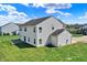Spacious, grassy backyard featuring a cozy patio, ideal for outdoor enjoyment and entertaining on sunny days at 6674 Buhrstone Ln, Avon, IN 46123