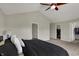 Main bedroom showcasing the spacious layout with vaulted ceiling, closet and door to other rooms at 6674 Buhrstone Ln, Avon, IN 46123