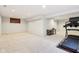 Open basement space with carpet flooring, recessed lighting, and a dedicated exercise area at 6707 Meadow View Ct, Avon, IN 46123