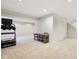 Spacious finished basement featuring carpeted floors, recessed lights, and a fitness area at 6707 Meadow View Ct, Avon, IN 46123